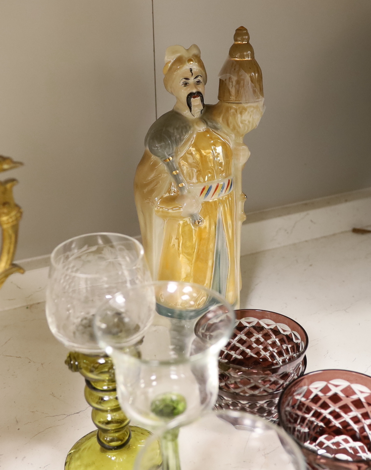 A French ruby lustre and ormolu mounted centrepiece, a green faceted glass bowl and cover, two Nymphenburg dishes, a pearlware dessert dish and other ceramics and glass